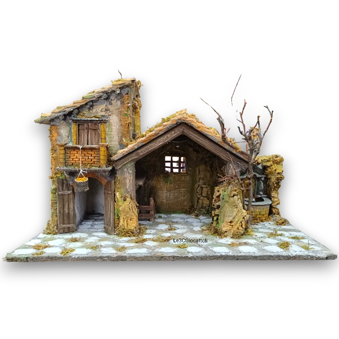Casa con paniera con capanna e fontana