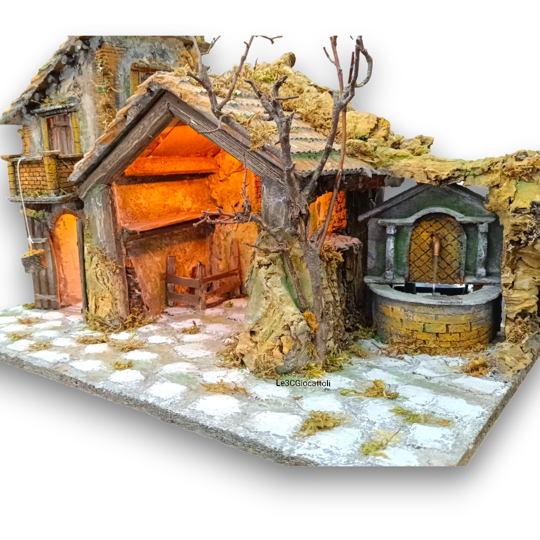 Casa con paniera con capanna e fontana